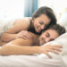 Romantic couple waking up in the morning
